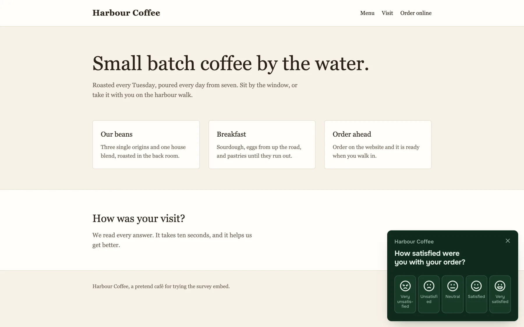 The same café's home page with a small survey in the bottom right corner: How satisfied were you with your order, with five faces and a close button.